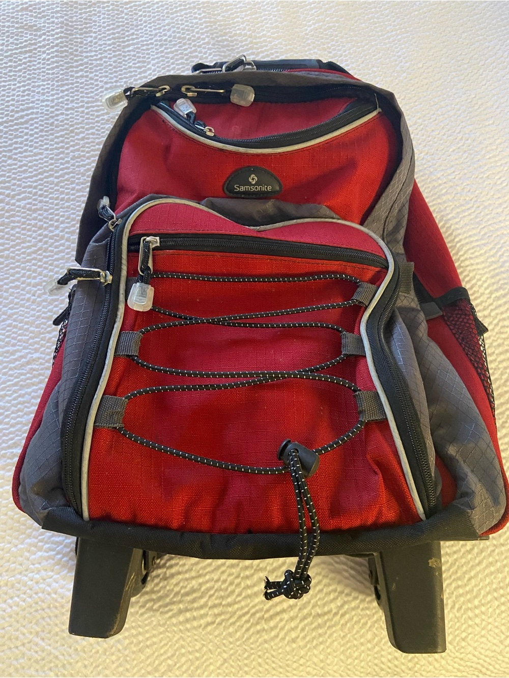 Samsonite Red and Gray Rolling Backpack